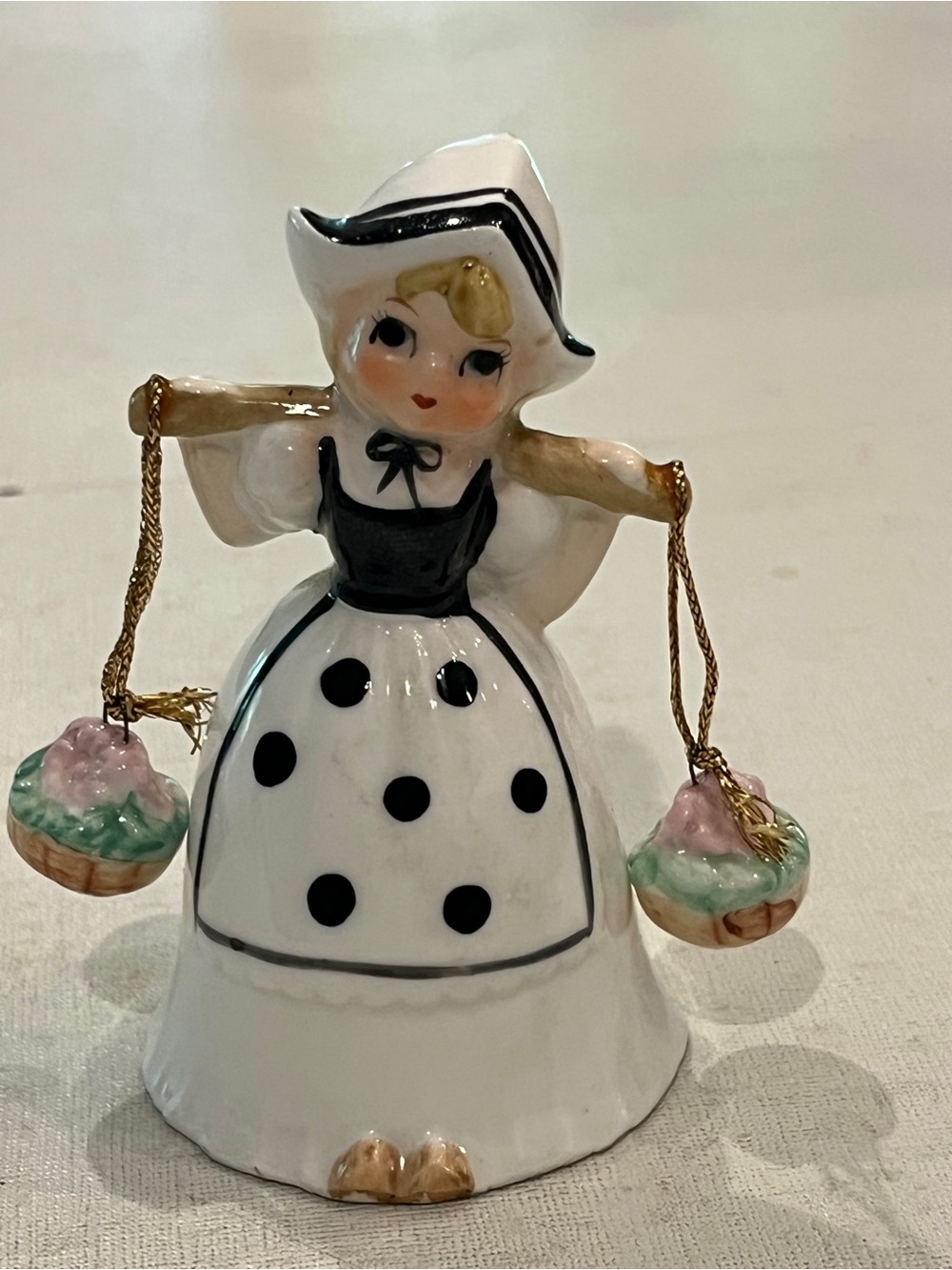Vintage Bone China White and Black Dutch Girl Figurine with Baskets bell.